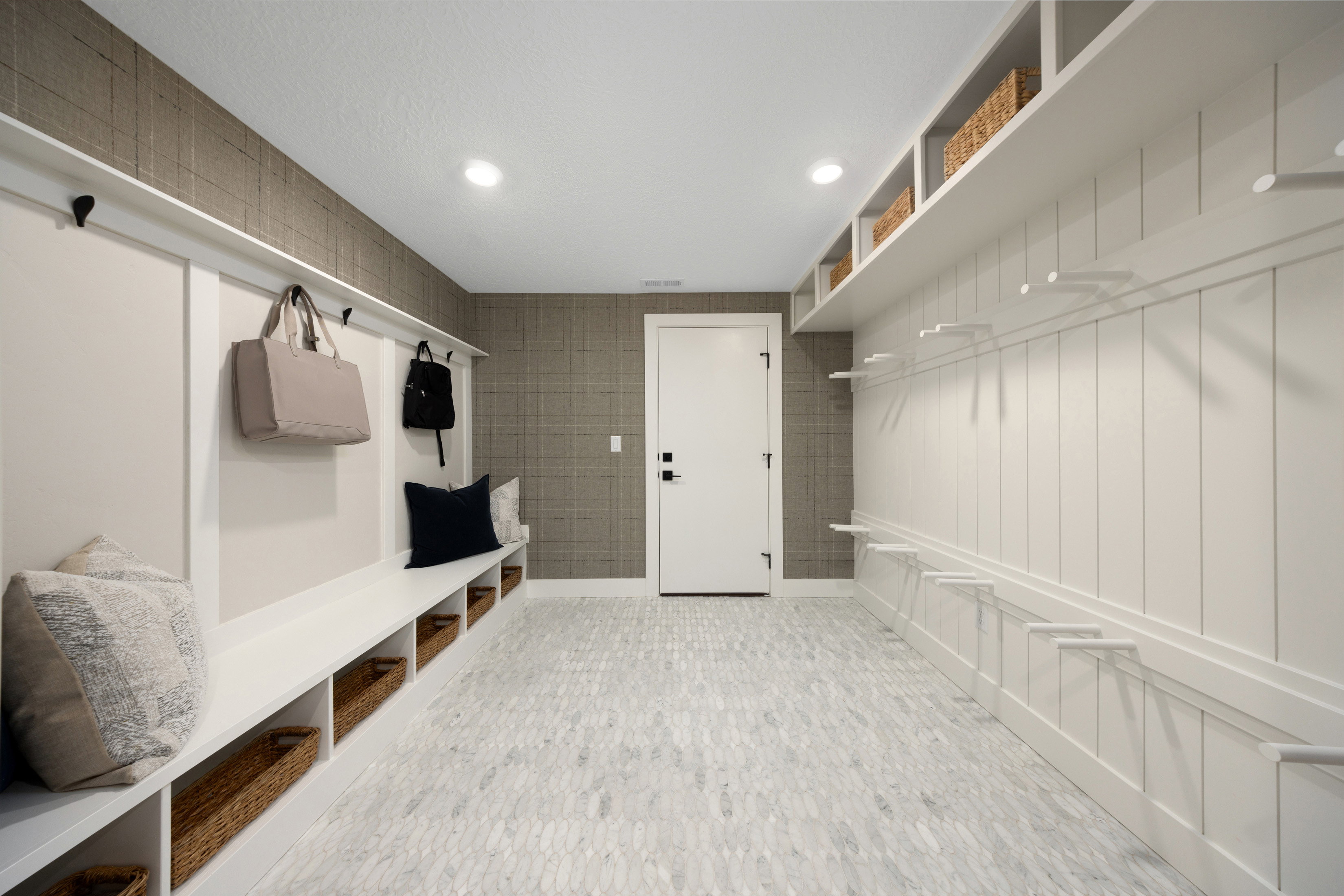 Mudroom with boot bench *Actual home may differ in color/material/options. Pictures are of finished homes of the same floor plan and may contain options/upgrades/ decorations/ furnishings not available at the advertised price.