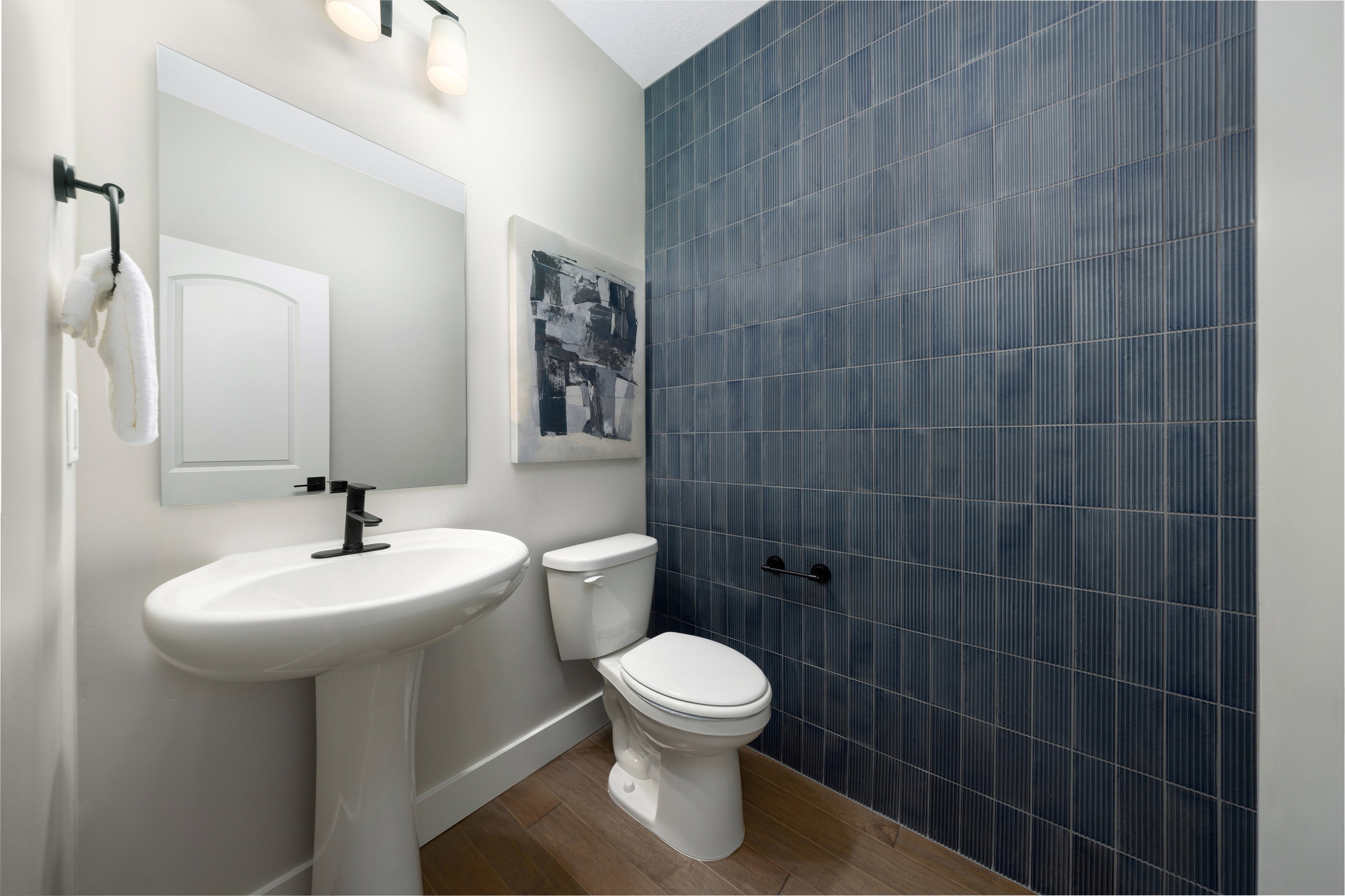 Powder Room  *Actual home may differ in color/material/options. Pictures are of finished homes of the same floor plan and may contain options/upgrades/ decorations/ furnishings not available at the advertised price.