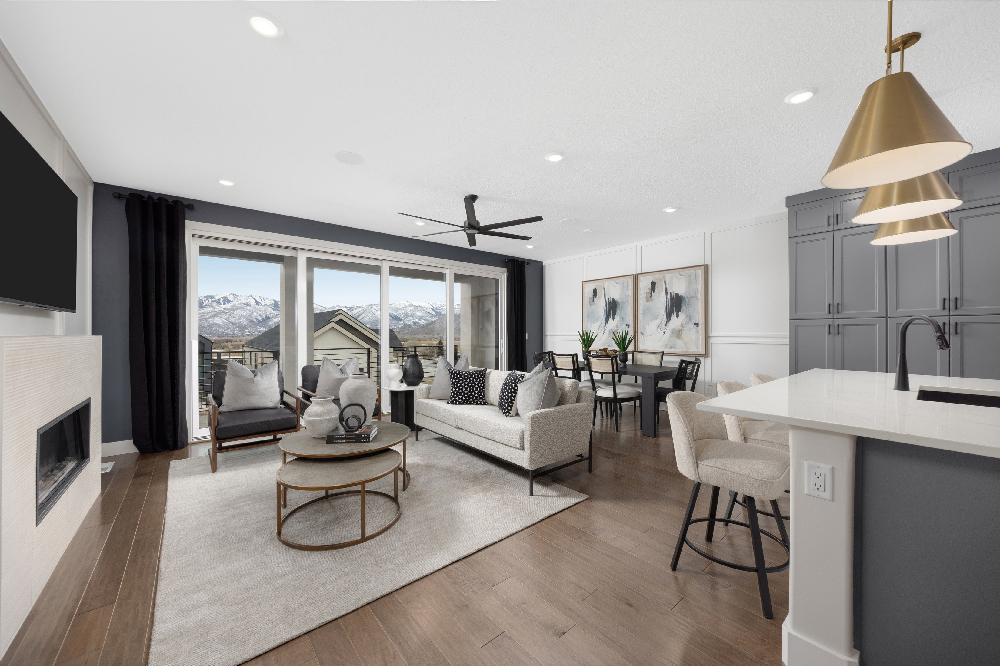 Gathering Room and Kitchen *Actual home may differ in color/material/options. Pictures are of finished homes of the same floor plan and may contain options/upgrades/ decorations/ furnishings not available at the advertised price.