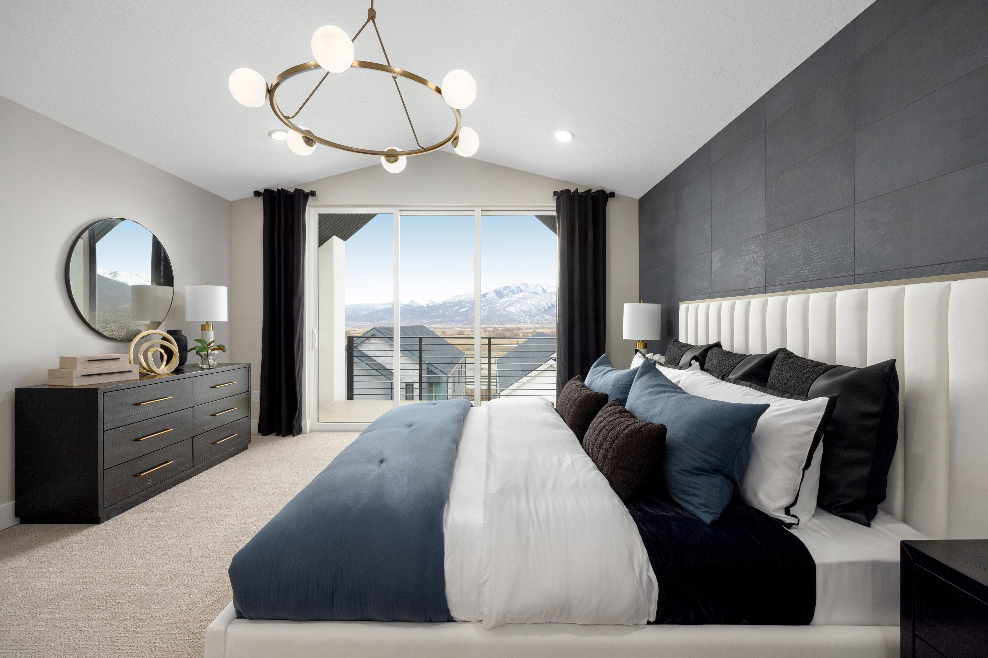 Owner's Suite featuring covered balcony  *Actual home may differ in color/material/options. Pictures are of finished homes of the same floor plan and may contain options/upgrades/ decorations/ furnishings not available at the advertised price.