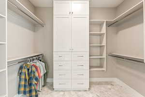 View of walk in closet