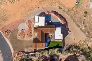 Aerial view of property's location featuring multiple patios and outdoor living space