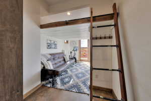 Bedroom #4 with loft bed above seating area or office space