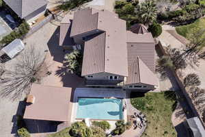 View from above of property with a pool area