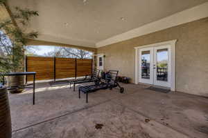 View of patio / terrace featuring french doors