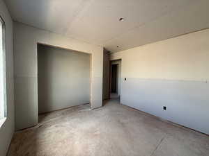 Unfurnished bedroom with a closet