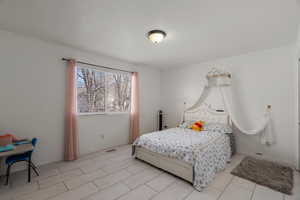 Bedroom featuring baseboards