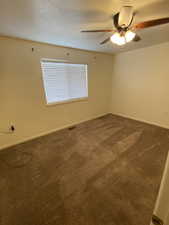 Bedroom #1 with carpet and ceiling fan