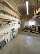 View of garage and storage