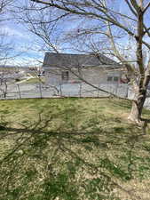 View of fenced backyard