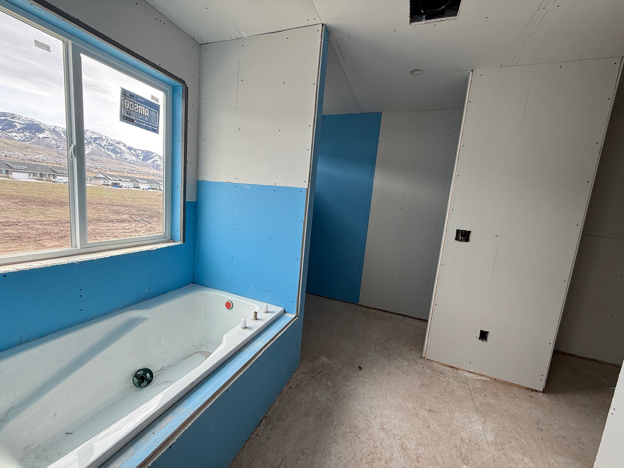 Full bath featuring a garden tub