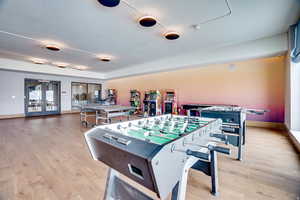 Game room featuring french doors