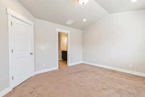 Primary Bedroom with vaulted ceilings