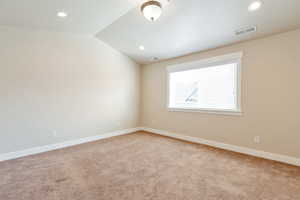 Primary Bedroom with vaulted ceilings