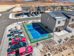 Aerial perspective of suburban area with a mountain backdrop