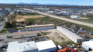 View of property location featuring an industrial area and a mountainous background