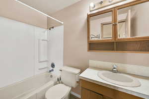 Full bathroom with vanity and bathing tub / shower combination