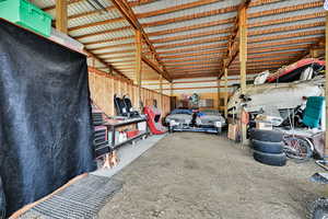 Garage featuring metal wall