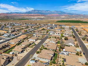 Aerial perspective of suburban area featuring mountains