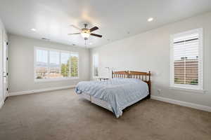 Bedroom featuring carpet floors, recessed lighting, and a ceiling fan