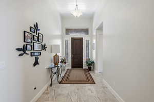 Entryway featuring baseboards