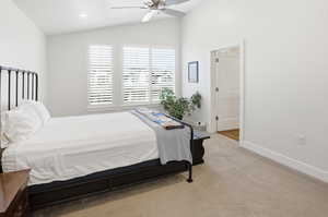 Bedroom with light carpet, lofted ceiling, recessed lighting, and ceiling fan