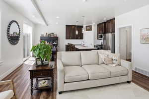 Living area featuring recessed lighting and light wood-style flooring