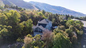 Aerial view of home and a mountainous background
