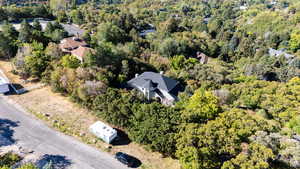 Drone / aerial view of property and RV parking