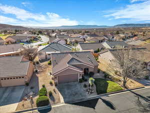 Aerial view of residential area with a mountain backdrop