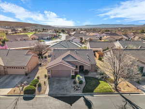 Aerial view of residential area with a mountainous background