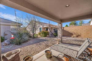 Fenced backyard featuring a patio area