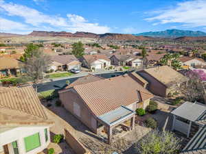Aerial view of residential area with a mountainous background