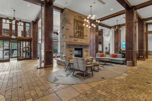 Common area with a high ceiling and recessed lighting