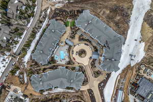 Aerial overview of property's location with nearby suburban area