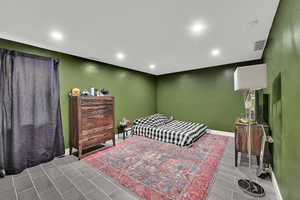 Bedroom featuring recessed lighting and baseboards