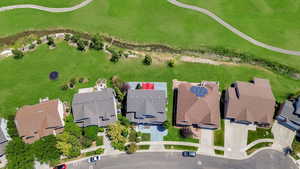 Aerial view of property's location featuring nearby suburban area