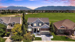Aerial view at dusk of a mountain view and a residential view