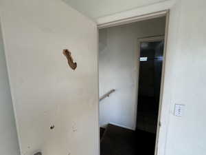 Hall featuring an upstairs landing