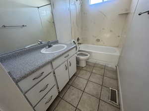 Full bathroom with vanity, bathing tub / shower combination, and light tile patterned floors