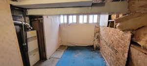 Below grade area with heating unit