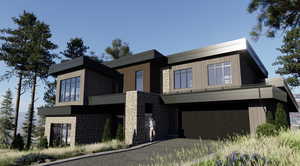 Modern home featuring stone siding