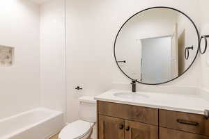 Full bathroom featuring vanity and bathtub / shower combination