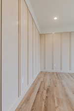 Unfurnished room featuring light wood-type flooring and recessed lighting