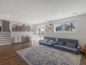 Family Room with French doors to Backyard,LVP Flooring & Recessed Lighting