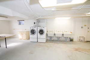 Basement featuring washer and dryer