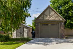 Detached garage with a storage shed
