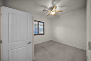 Unfurnished room with carpet flooring and ceiling fan