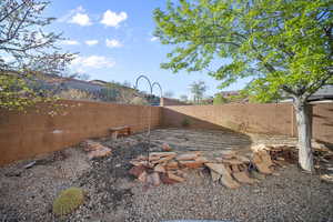 View of fenced backyard