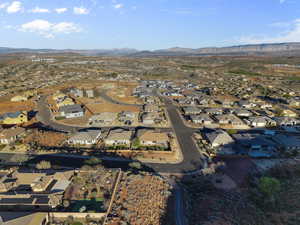 View of property location with nearby suburban area